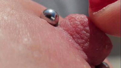 Playing Pierced Nipples Close Up on Balcony